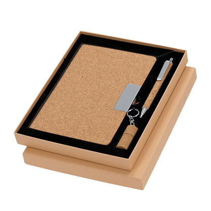 Conjunto de bloco de notas e caneta em cortiça com porta-chaves.