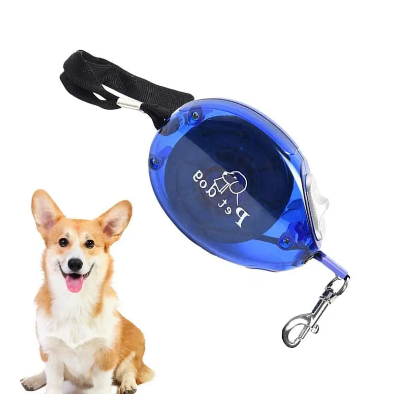 Blue retractable dog leash with a dog sitting next to it on a white background