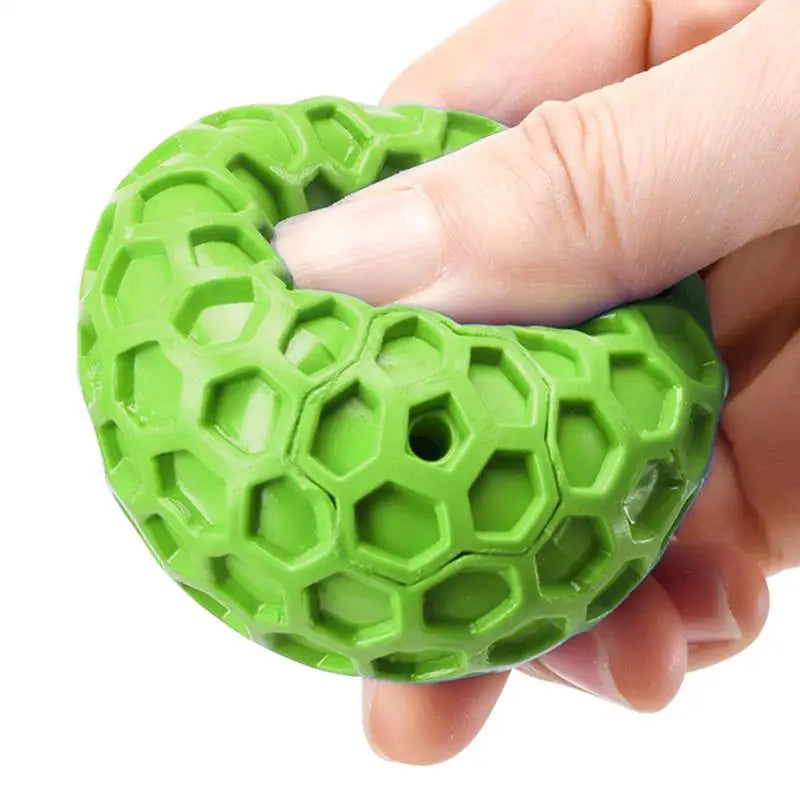 interactive squeaky dog toy balls squeaky dog toy balls in hand, showcasing durable design and textured surface for engagement.