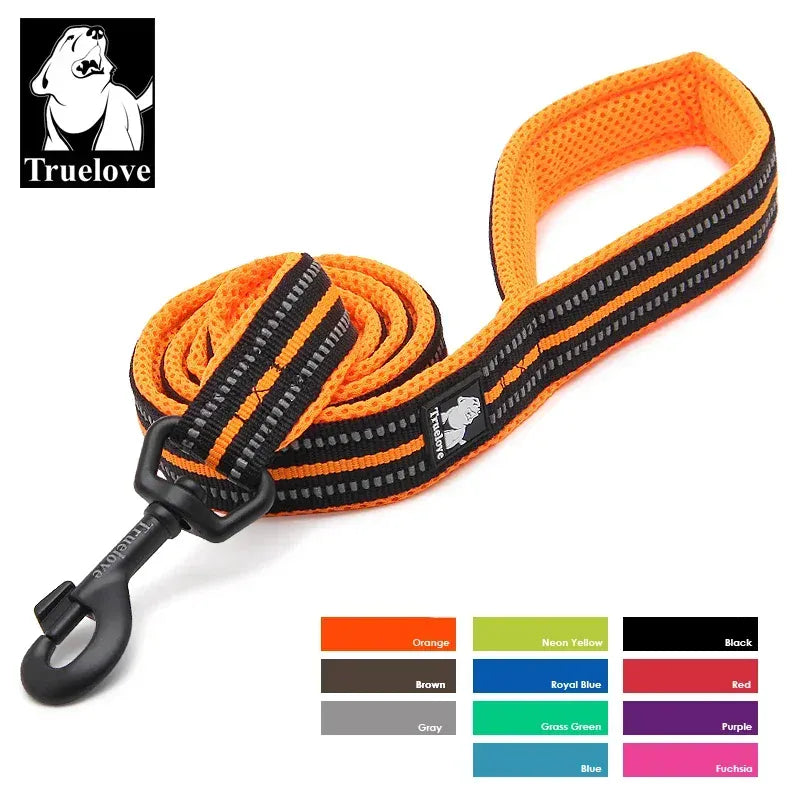 Orange and black dog leash with Truelove branding on a white background